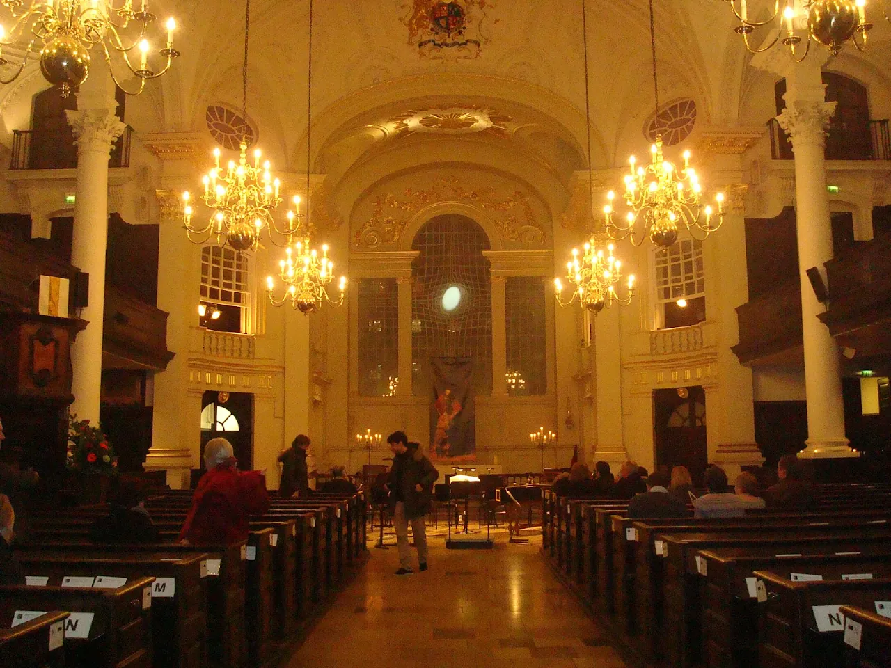 Illuminated interior of St Martin-in-the-Fields church during a concert